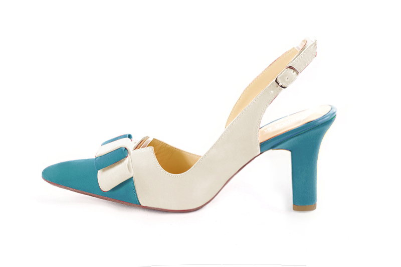 French elegance and refinement for these peacock blue and off white dress slingback shoes, with a knot, 
                available in many subtle leather and colour combinations. The pretty French spirit of this beautiful pump 
will accompany your steps nicely and comfortably.
To be personalized or not, with your materials and colors.  
                Matching clutches for parties, ceremonies and weddings.   
                You can customize these shoes to perfectly match your tastes or needs, and have a unique model.  
                Choice of leathers, colours, knots and heels. 
                Wide range of materials and shades carefully chosen.  
                Rich collection of flat, low, mid and high heels.  
                Small and large shoe sizes - Florence KOOIJMAN